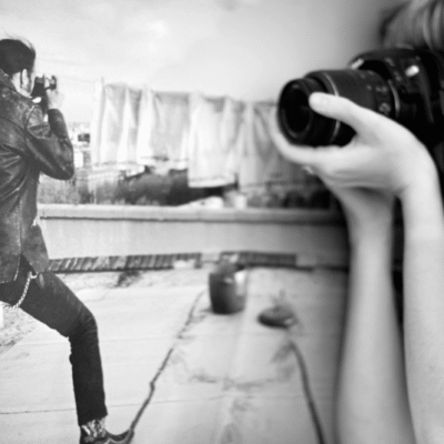 Fotógrafo contra fotógrafa
