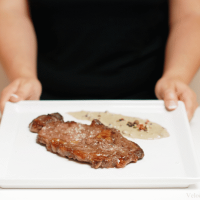 Salsa de pimientas con carne a la piedra
