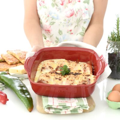 Huevos rellenos de jamón al gratén